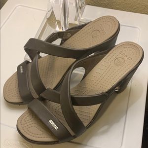 Crocs rubber straps heels.